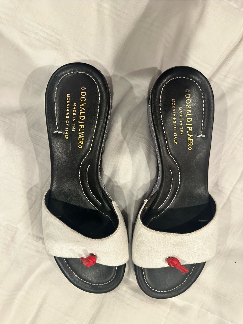 Donald J. Pliner White Slide Mules with Red Knot Accent